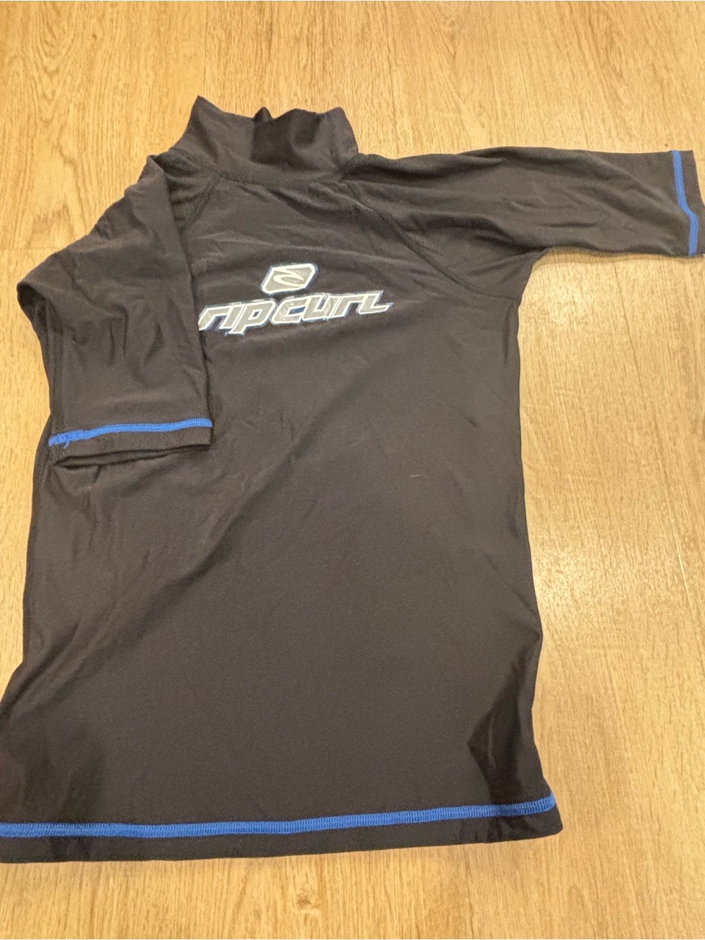 Rip Curl Black Rash Guard with Blue Trim